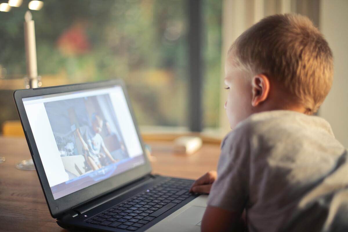 boy-watching-video-using-laptop-821948 (1) (1)